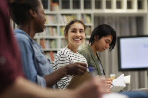 group of friends meeting in the library